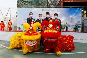 Groundbreaking Ceremony - taking photo with lions